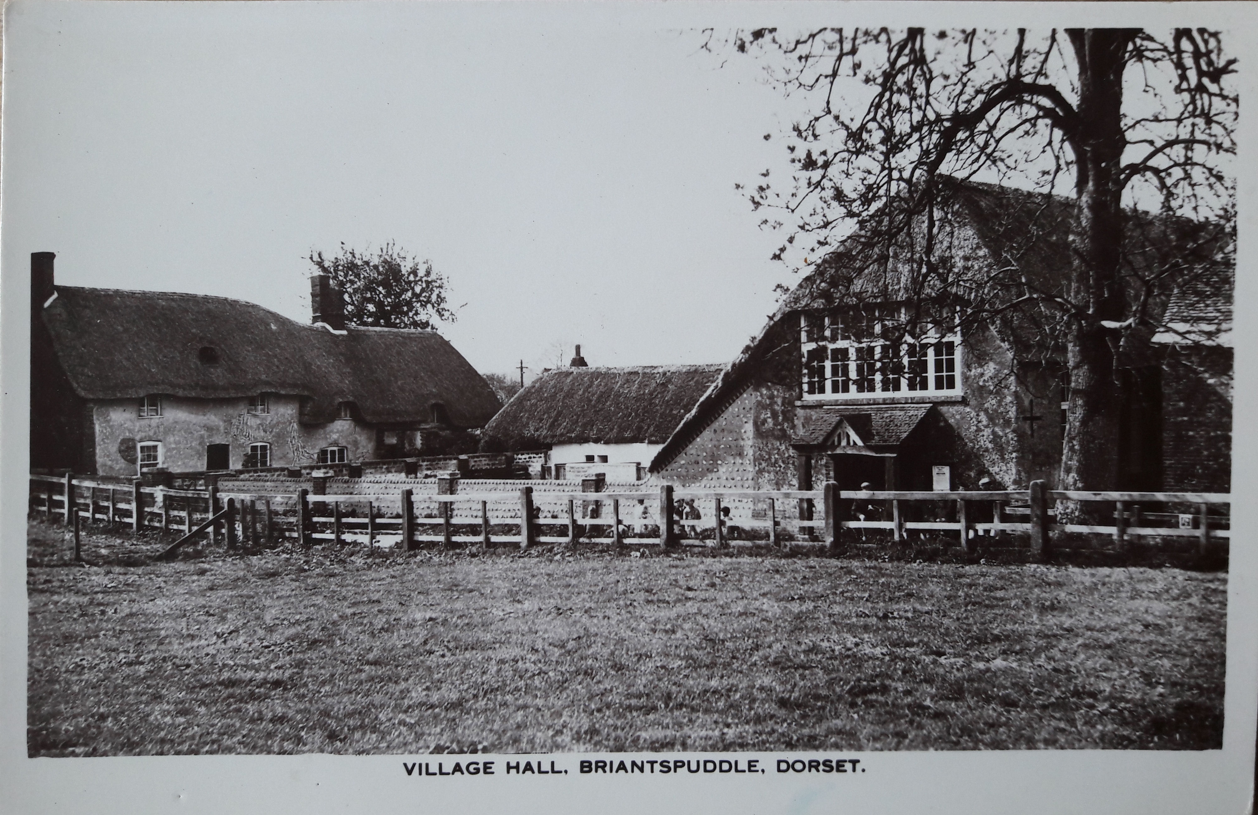 picture of a post card circa 1929 showing the village hall from the green